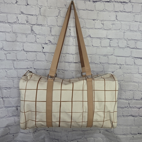 Tan and Cream Travel Bag with Geometric Pattern - Picture 2 of 11